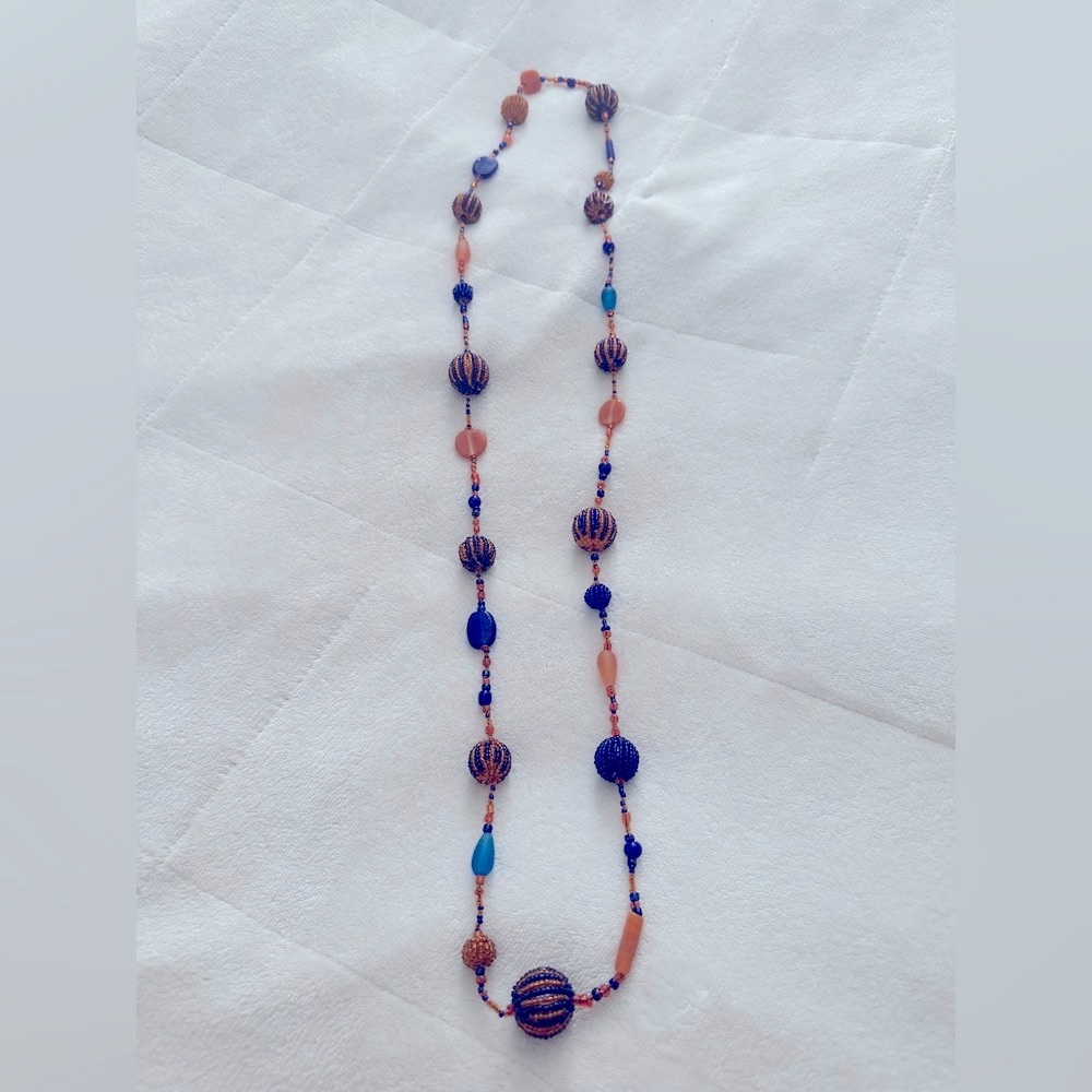 Elegant Glass Beaded Necklace in Blue and Orange wore with Auburn attire